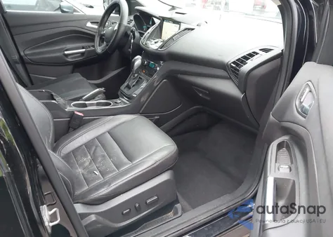 2016 Ford Escape Titanium z USA, uszkodzony, nr VIN 1FMCU0JX6GUB79270